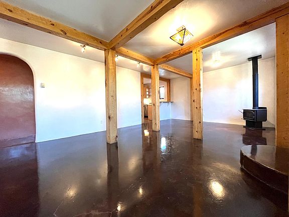 open living area radiant stained concrete floors