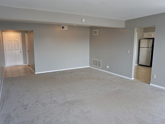 View from living room - front door entry way and kitchen