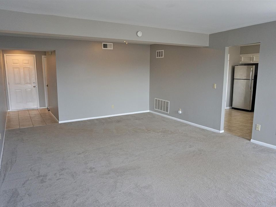 View from living room - front door entry way and kitchen