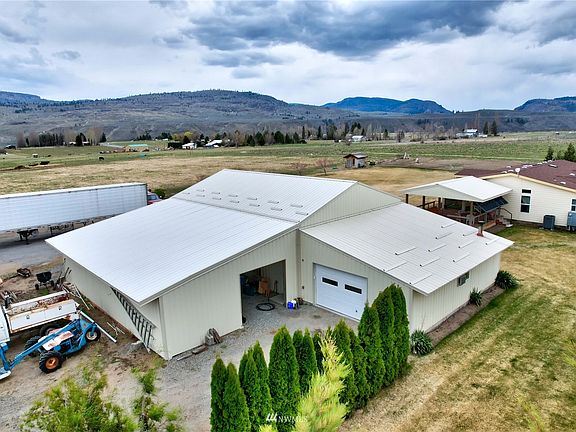 The back of shop showing the lean-to and additional finished work space.