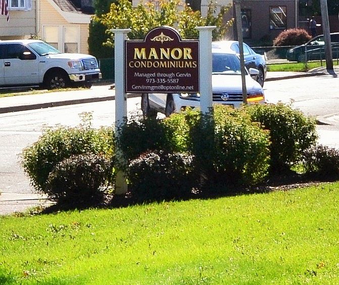 Sign to building