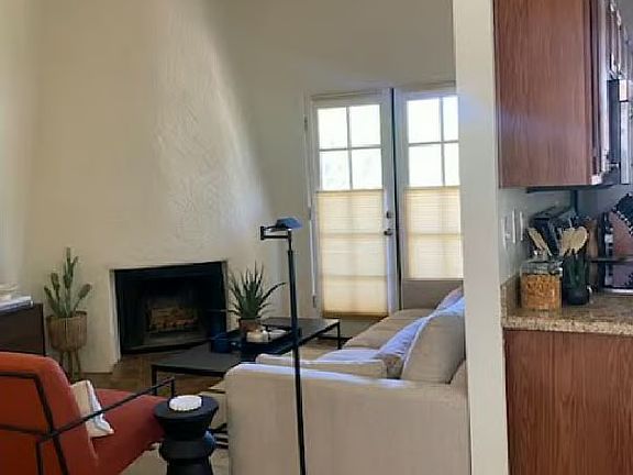 10' ceilings and wood burning fireplace