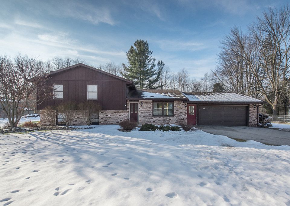 A quiet & impeccable retreat.... you'll appreciate the open floor plan, tasteful decor & many updates of this 3 bedroom, 2 full bath home located on a private road in Homer Twp.  The open layout provides abundant natural light, a living room & family room plus an area attached to the laundry that could be used as an office, craft area or workout space. Updated features include-  a kitchen in 2012 with newer appliances, counter tops, stone back splash & pantry & a bath in 2009 with ceramic tile, jet tub & linen closet. Additional enhancements- newer carpet, flooring, lighting, 6 panel doors & paint throughout most of the home, plus, some newer windows. The improved details continue with newer electrical with all tamper resistant outlets, roof & gutters in 2006, furnace and central air in 2003, 2.5 car attached garage with workbench, large deck with patio area & a spacious & private back yard. Great curb appeal, location & updated amenities & located in Bullock Creek schools.