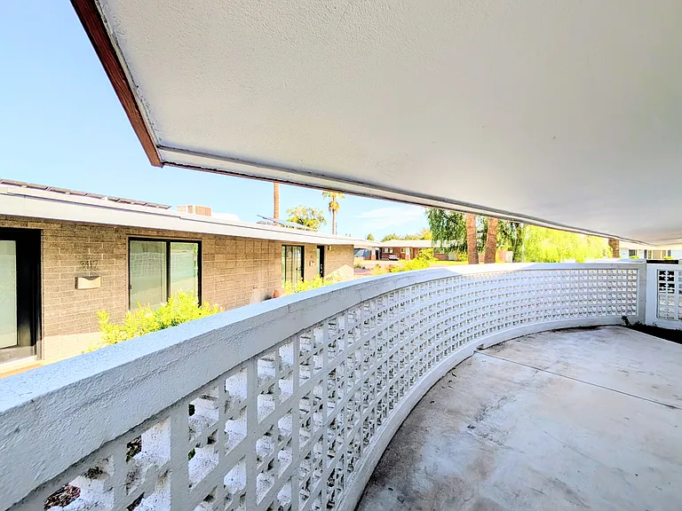 Large Private patio (concrete + a small area for plants etc)
