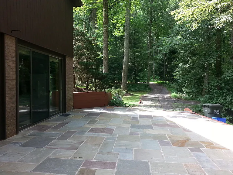 Bluestone Patio showing driveway ahead and unit entrance on left