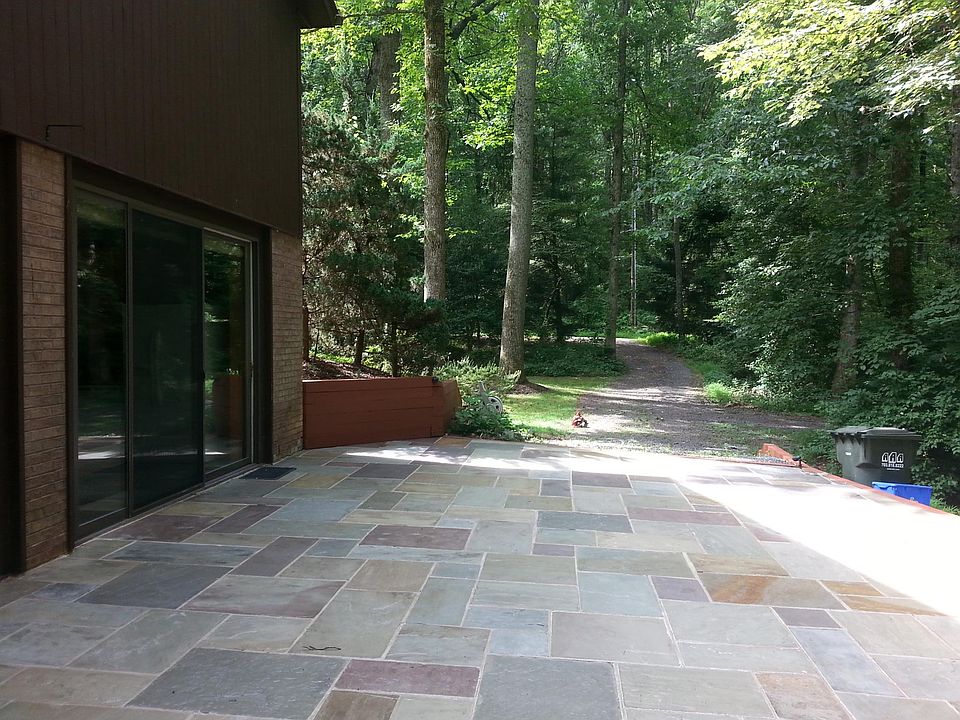 Bluestone Patio showing driveway ahead and unit entrance on left