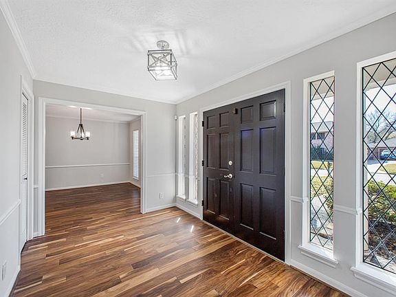 Gorgeous entry with beautiful lead windows. It's huge too, 12x8.