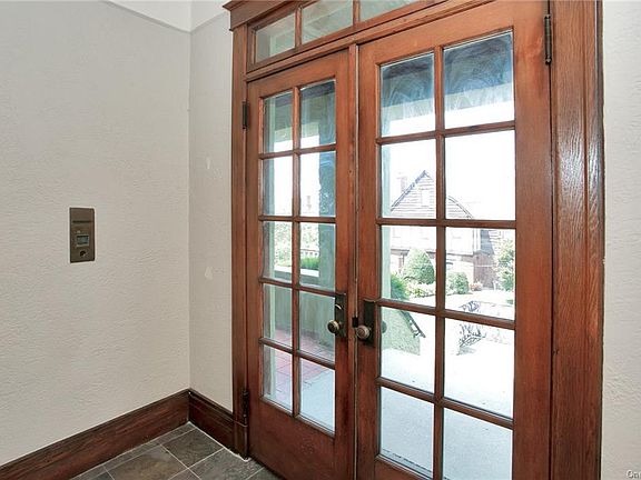 Front Foyer - Impressive brownstone entrance doors.