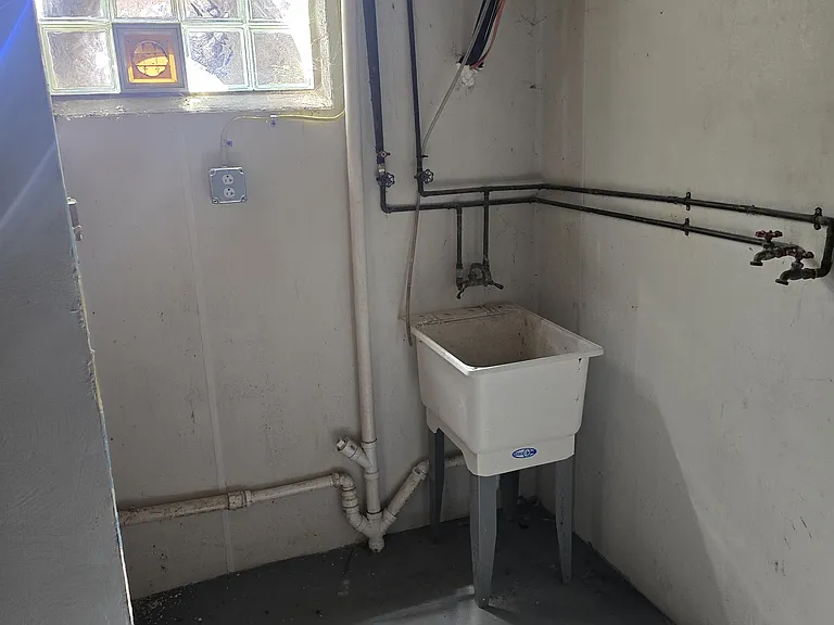 Laundry area in basement
