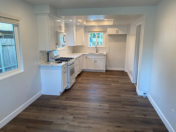 Eat-in Kitchen. All new cabinets, Quartz counters, Single basin stainless steel sink.