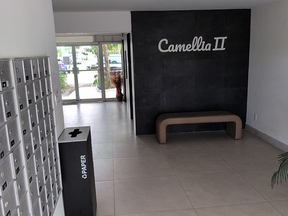 Recently renovated lobby for building Camellia 2 with mail boxes.