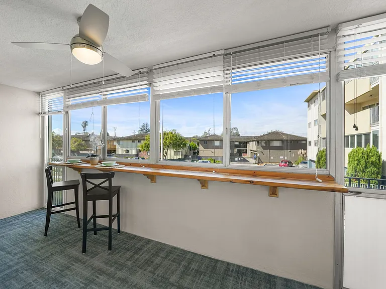 Enclosed balcony could be office space