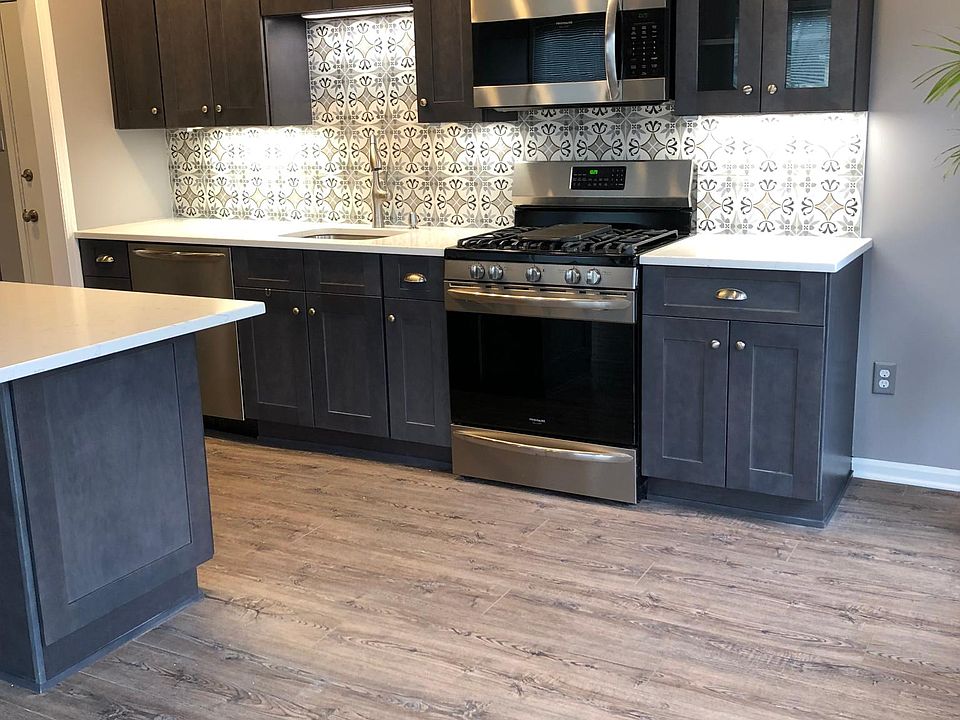 Brand New Kitchen with Stainless Steel Appliances and Quartz