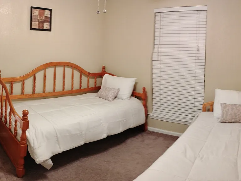 2nd guest bedroom - (sleeps three, has trundle bed as well)