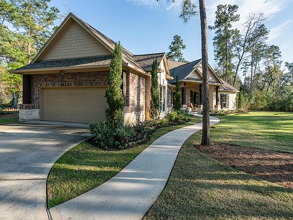 The long drive allows for plenty of parking and the two car garage is oversized for additional storage. Plus...