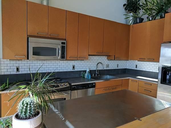 Kitchen island stays with condo