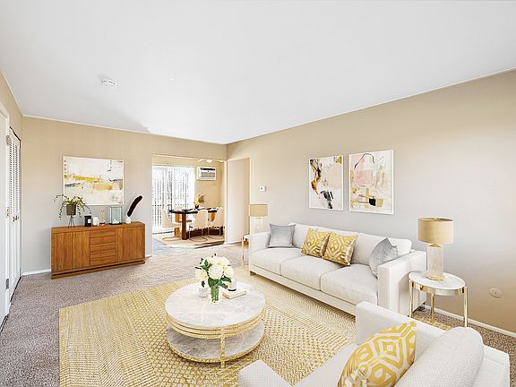 Gables of Troy large living space with doorwall leading to fresh air p