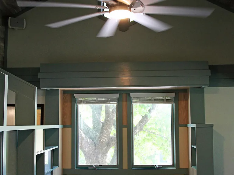 High ceiling and large ceiling fan.