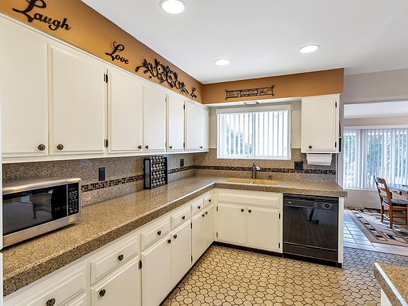 Enjoy granite countertops in your fully stocked kitchen with plenty of like-new dish ware, cookware and bakeware.