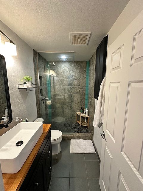 Second Floor Full bathroom accessible from each bedroom with closet storage.