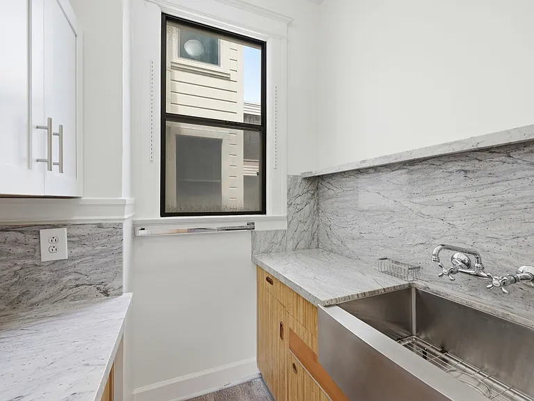 Kitchen Sink and storage area