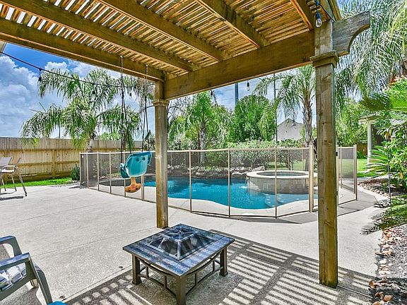 Escape from the summer heat with the pool, spa, cabana and multiple covered seating areas.