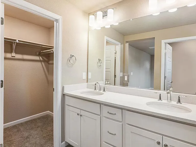 Master bedroom, bathroom, and walk-in closet.