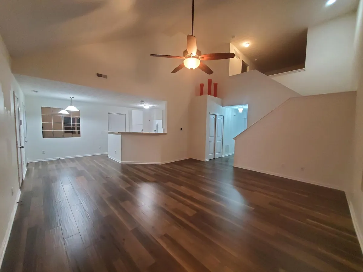 Great Room view to Kitchen and Dining area - 5813 Ivy Branch Dr