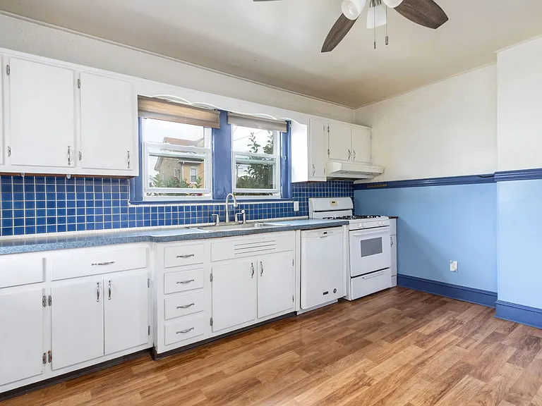 Large eat-in kitchen with dishwasher and garbage disposal.