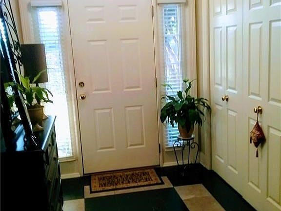 Entry Foyer with marble flooring and large closet!