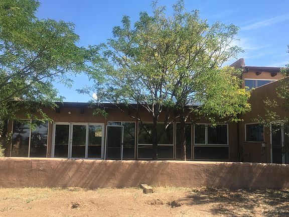 Looking at the courtyard and south face of house