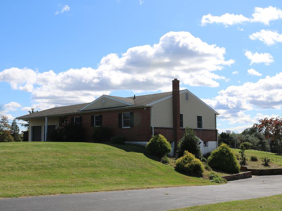 Front of house with side driveway