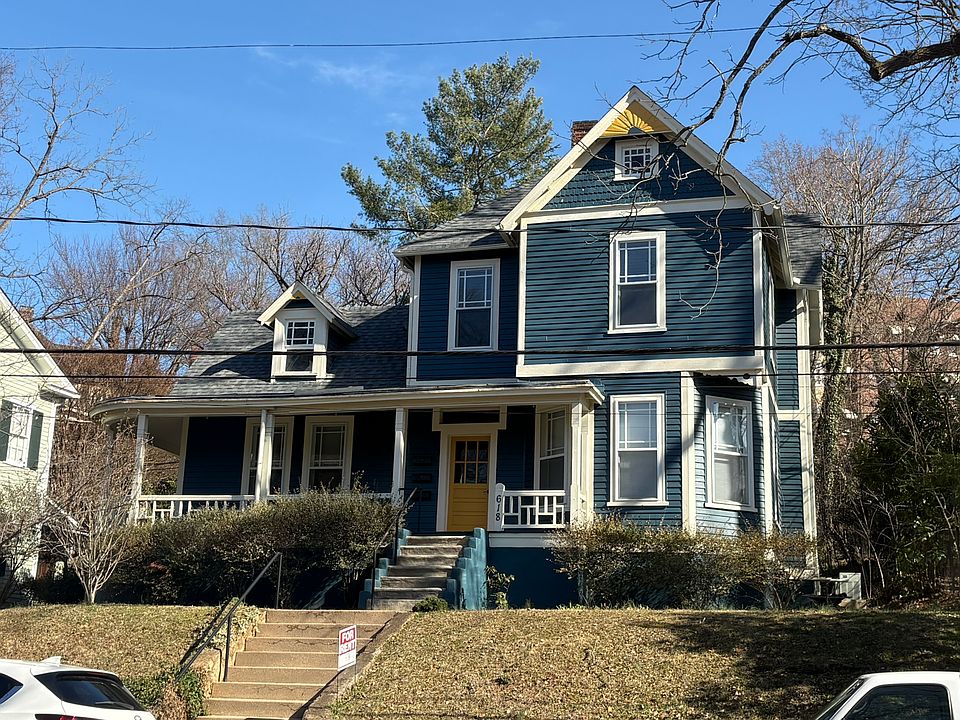 Front of House. Apt. 1 is on the main level on left side of wrap-around porch.