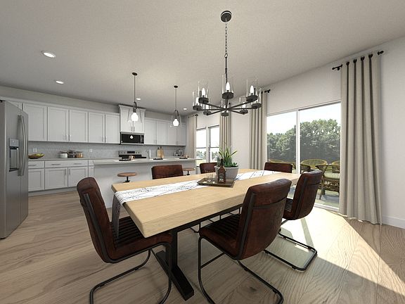 Virtually staged dining room in the Dakota floorplan.