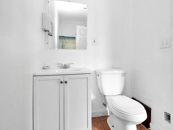 Half bath. Laundry hook ups are where I am standing.