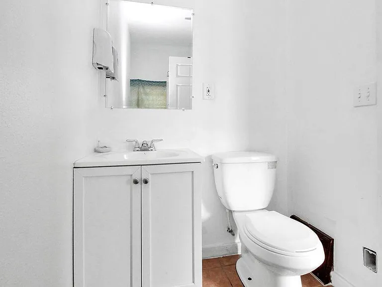 Half bath. Laundry hook ups are where I am standing.