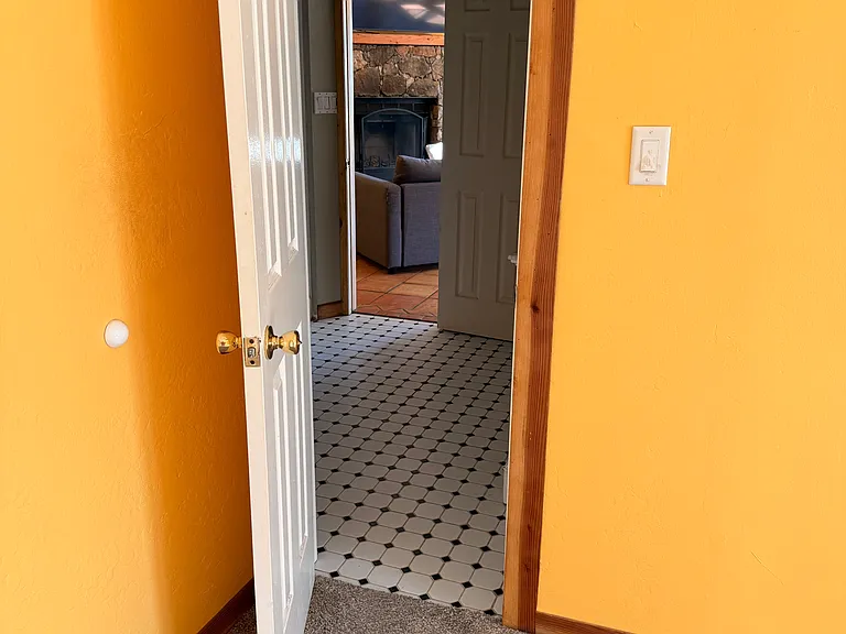 Bedroom door going into the bathroom