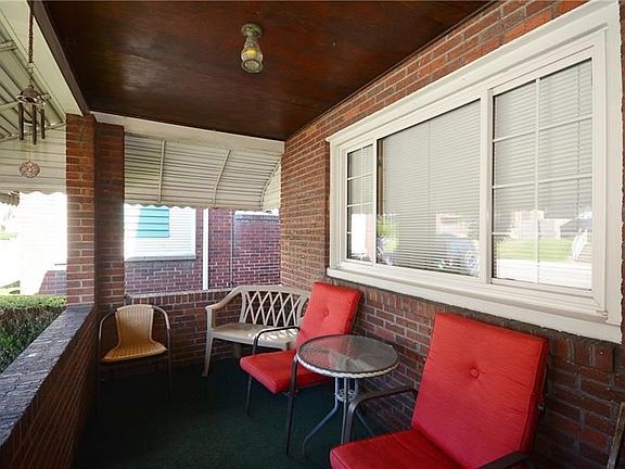 Enjoy relaxing on your covered front porch.