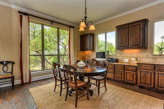 The breakfast room features an extended countertop and cabinet space.