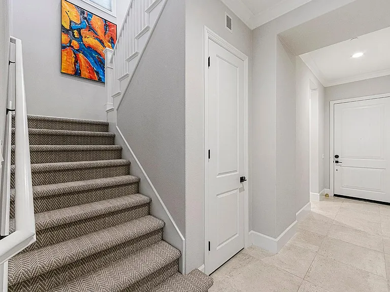 Easy welcoming stairway to the second level.