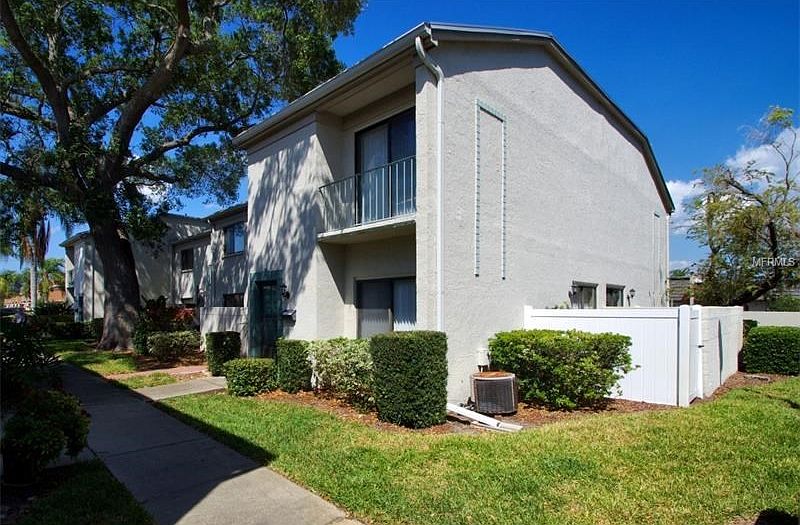 Front of unit showing fenced open pation on the side.