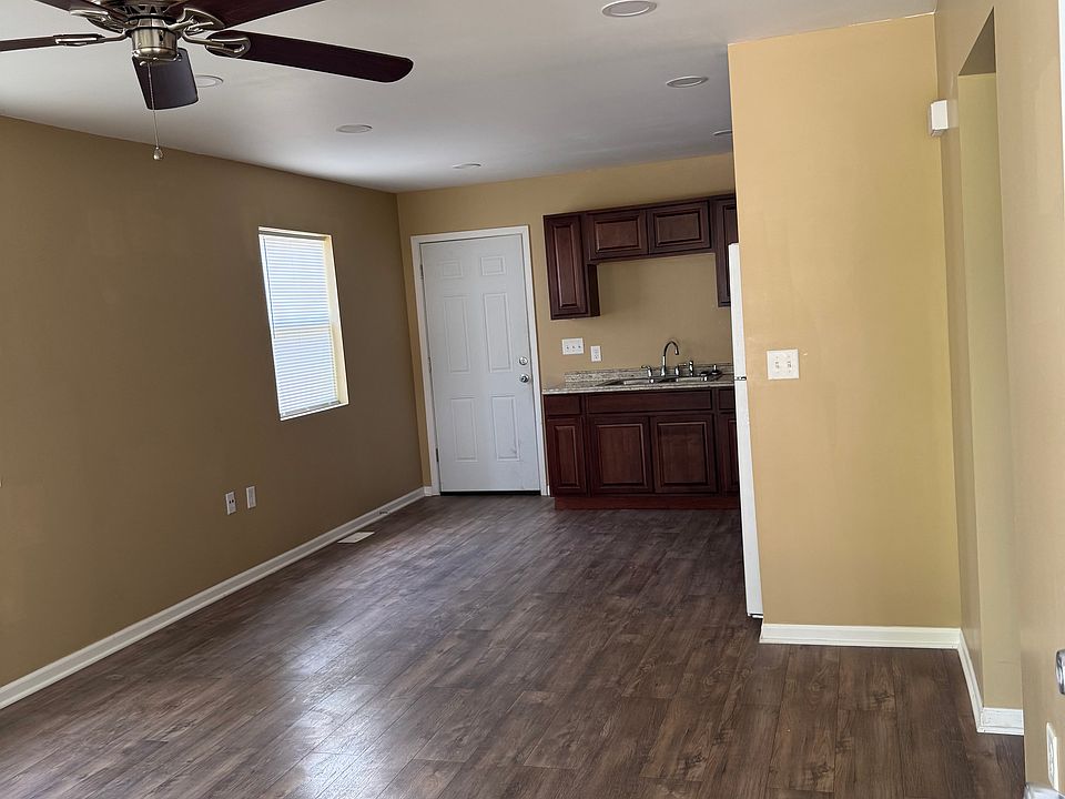 View of kitchen from living room space