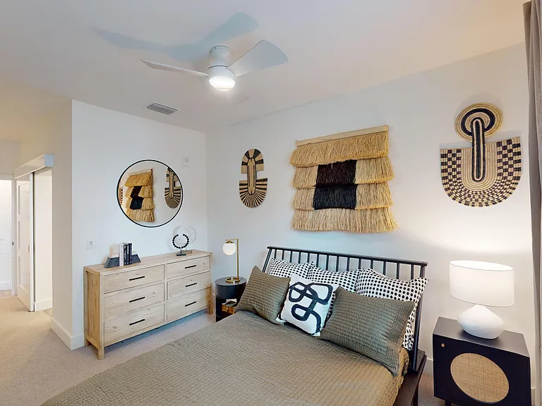 Primary bedroom with ceiling fan & oversized closet