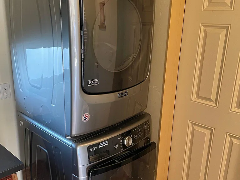 Laundry in bathroom.