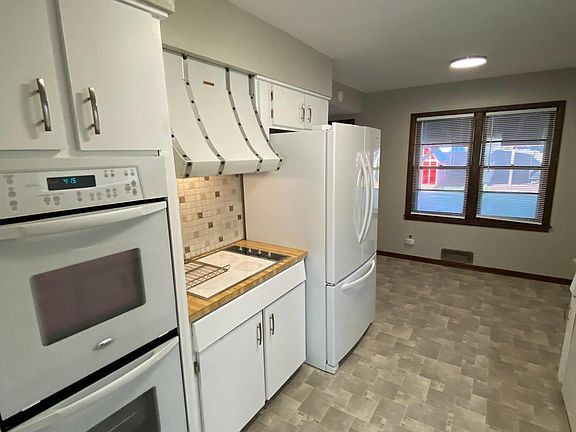 Double-stack oven and oversized refrigerator