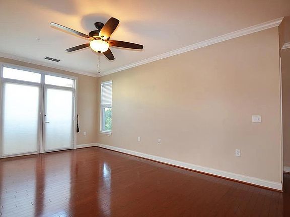 Living space with hardwood floors throughout.