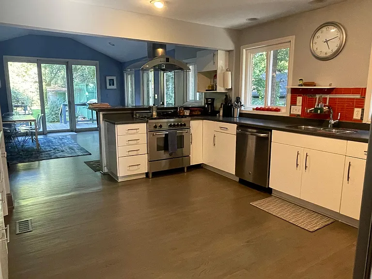 Open floor plan kitchen -dining area with bar
