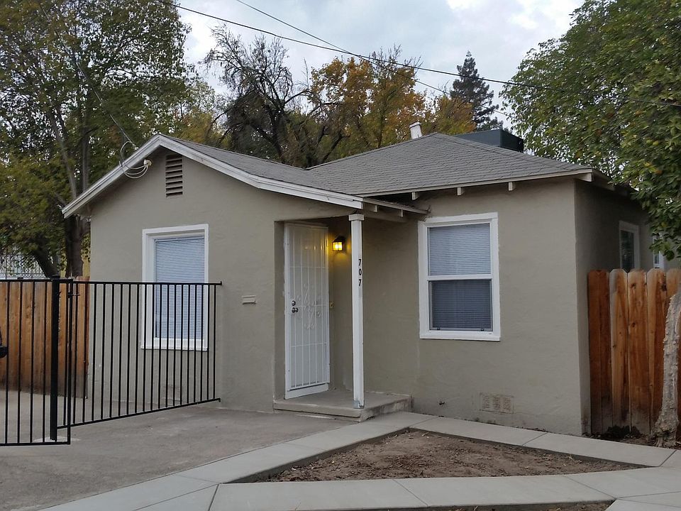 Front of Unit with parking