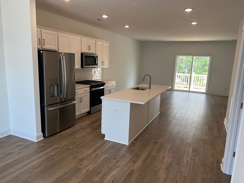Chefs Kitchen with Gas Range, Quartz counters, and Huge island!