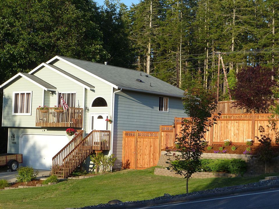 House sits on a corner lot.